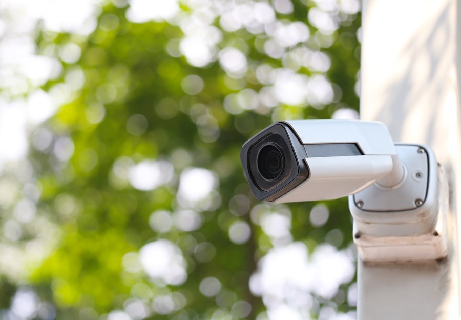 Surveillance camera installed in an outdoor space of a home 