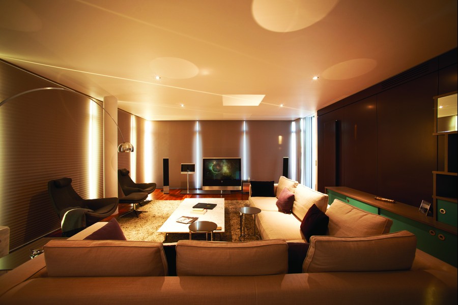 LED light fixtures brightening a stylish living room