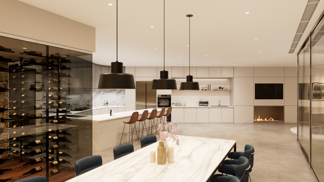 Modern kitchen and dining area with a marble island, glass wine storage, white cabinets, built-in appliances, fireplace, and a large table with navy chairs.
