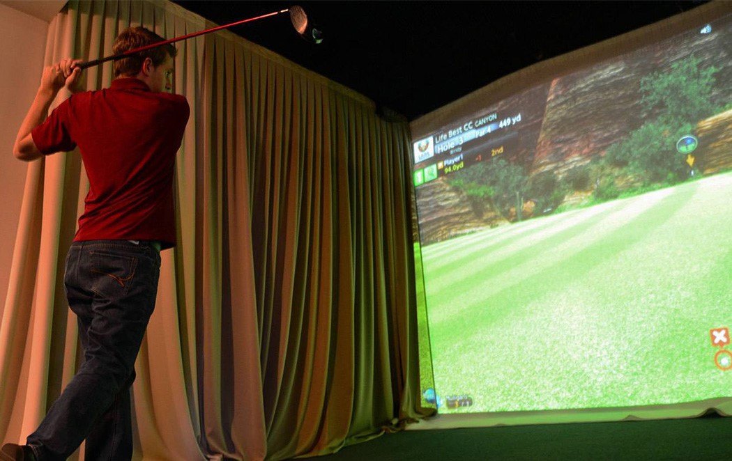 Practice Your Swing All Winter Long with a Home Golf Simulator 